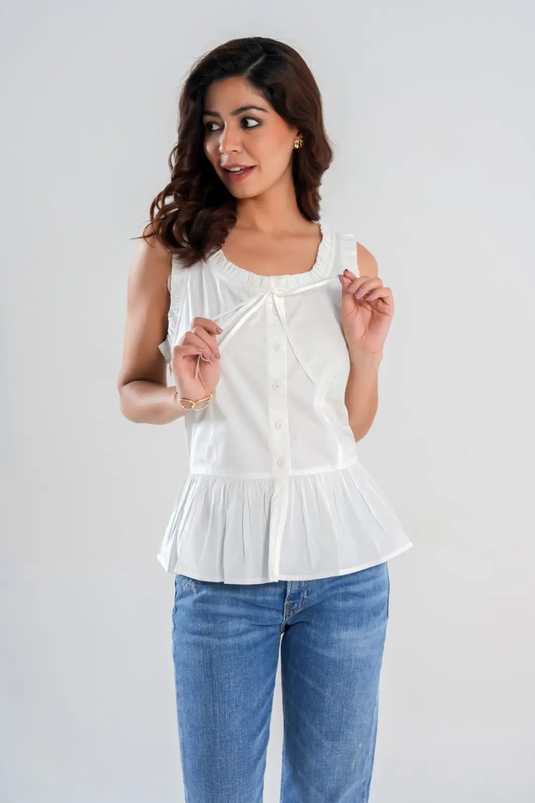 White Sleeveless Peplum Button Up Top with Frill detail