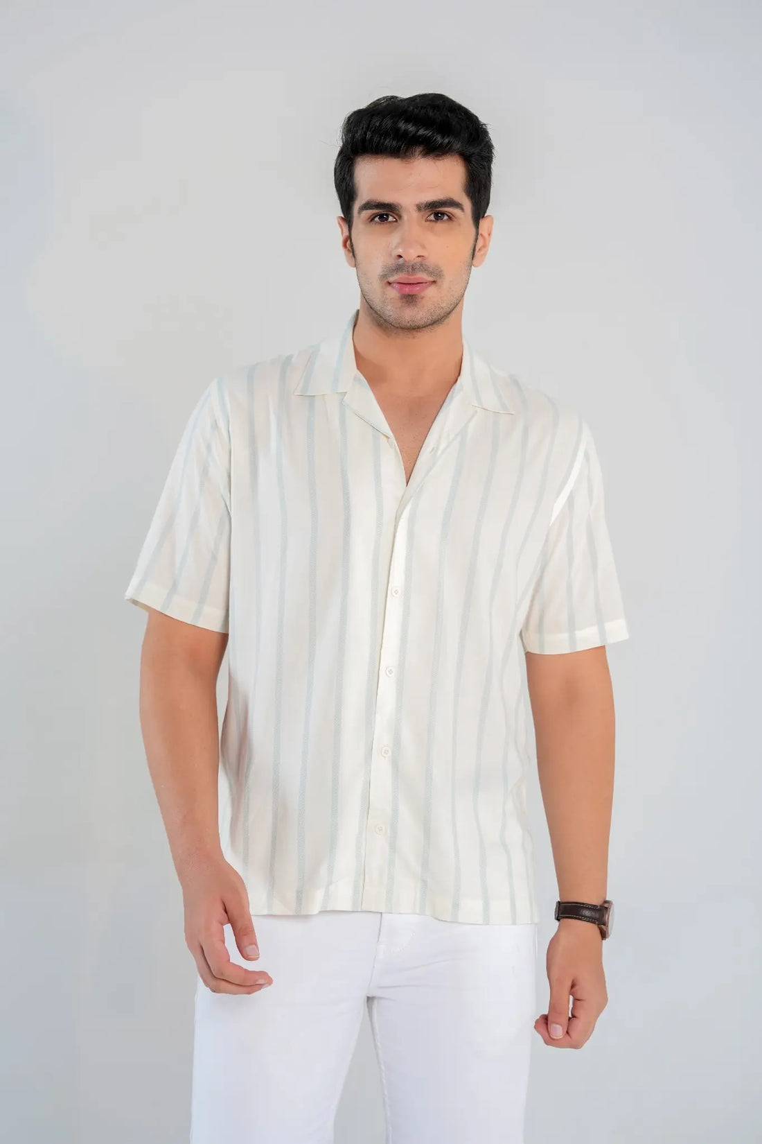 Front view of men’s short sleeve white and blue striped cotton shirt with Cuban collar